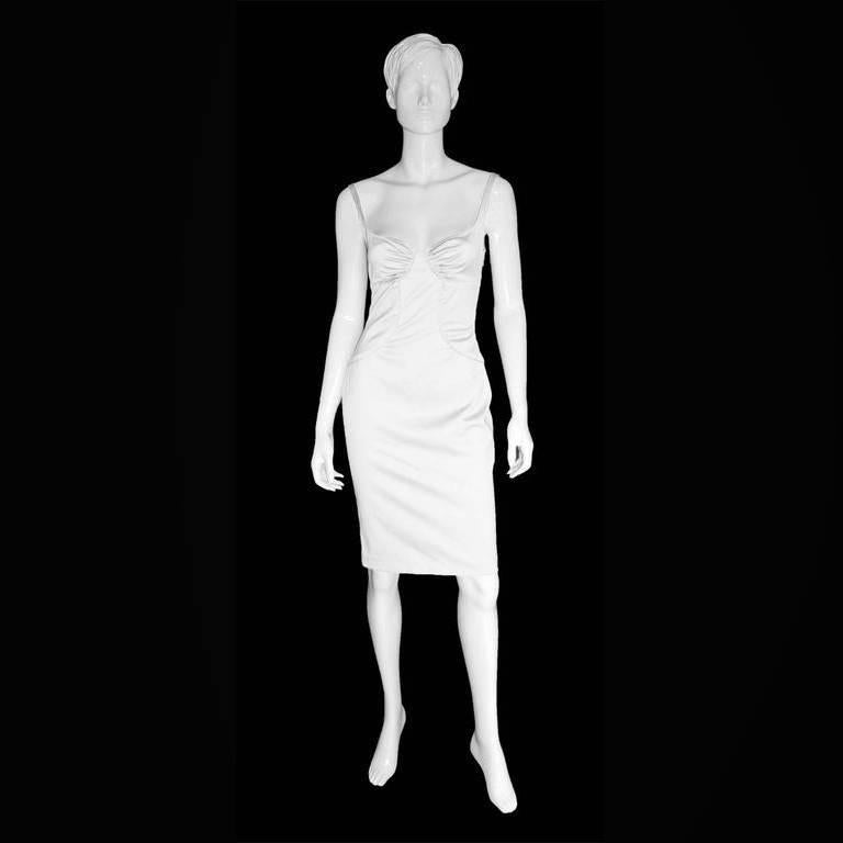 Rare & Iconic Tom Ford Gucci FW 2003 White Corseted Bustle Dress!

Who could ever forget Tom Ford's fall/winter 2003 Collection for Gucci... with all of that corseted styling & heavenly detailing? Well this heavenly white bustle dress,