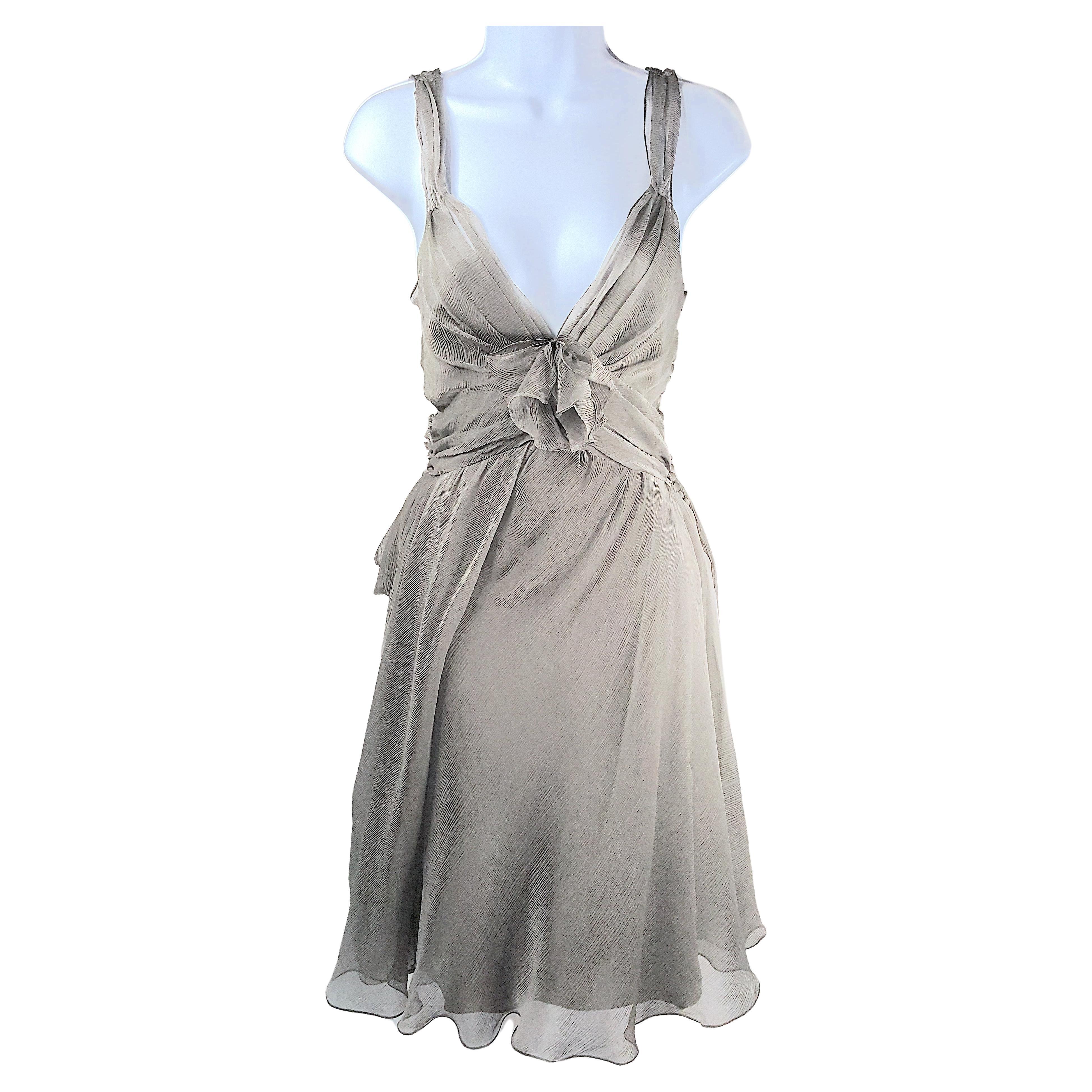 During John Galliano's first year as French fashion-house Christian Dior Creative Director in Paris for haute couture and ready-to-wear in 1997, he designed for his Spring/Summer 1998 collection this ballerina-like layered, bias-cut, silvery