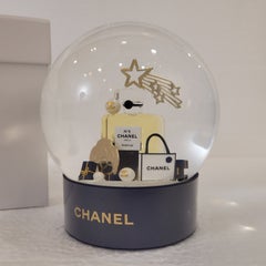 limited edition snow globe from the prestigious French fashion house CHANEL.