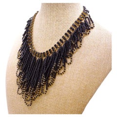 Art Deco cascading necklace of jet and crystal beads with a gold plating
