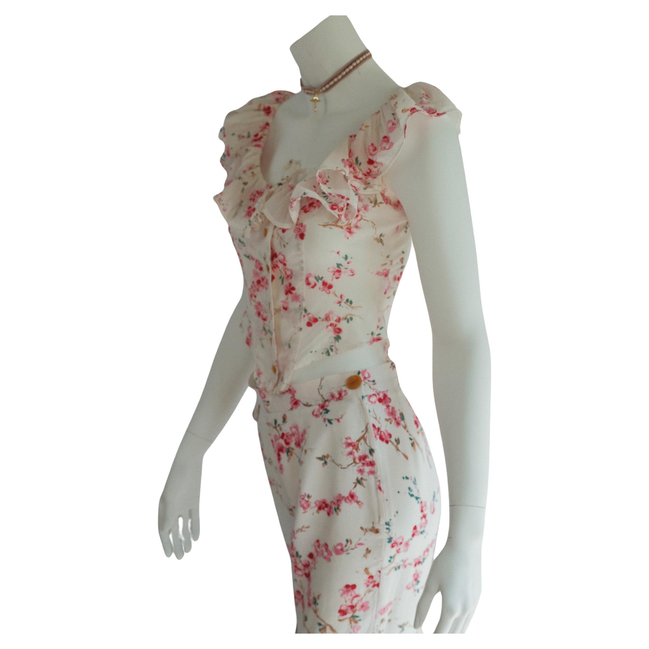 Archival 1990s Vivienne Westwood Red Label archival 90s floral ruffle corset and Trousers set co ord 

Floral, button front, frill sleeve outrageous
As seen on Pamela Sanderson new show

Good condition for age, minor wear to be expected of any