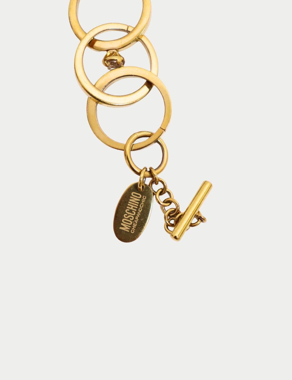 Moschino Cheap and Chic Pulsera circular dorada 