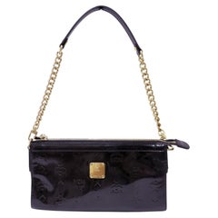 Bolso de hombro pequeño MCM de charol negro con estampado Visetos y monograma