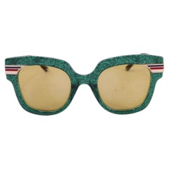 Gucci Oversized Square Sunglasses – Green Frame with Web Stripe Detail