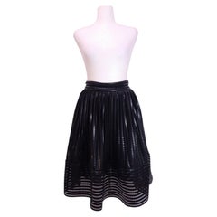 Falda midi plisada de imitación de piel negra de Maje - US 4 / EU 36