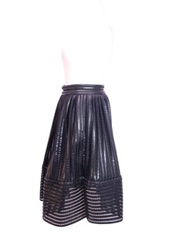 Falda midi plisada de imitación de piel negra de Maje - US 4 / EU 36
