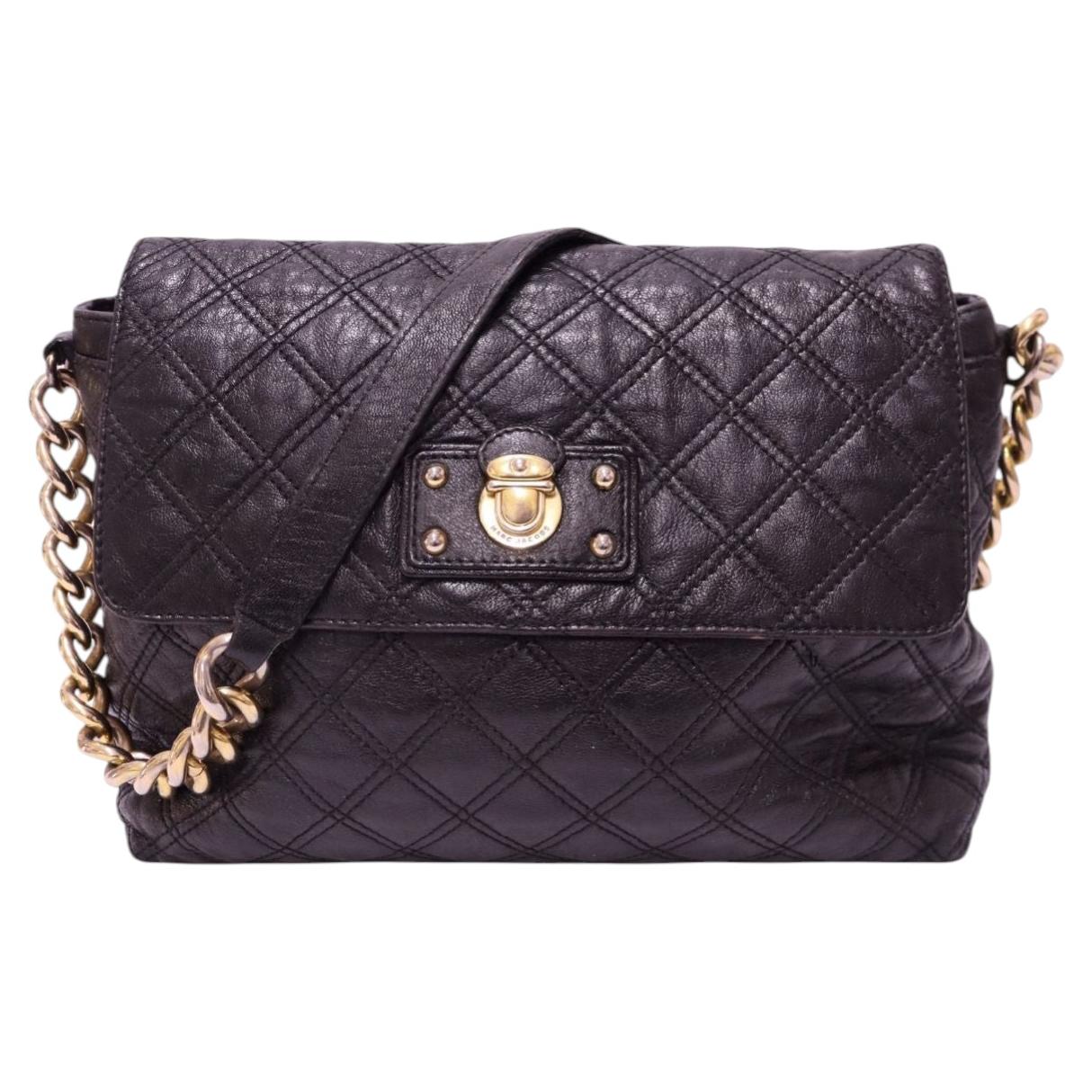 Who owns the Marc Jacobs brand?