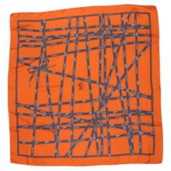 Hermès Orange Silk Scarf with Ribbon Print
