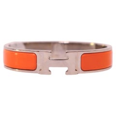 Hermès Clic H Orange Enamel Palladium-Plated Bracelet