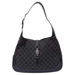 Borsa a tracolla Gucci Jackie in tela GG nera