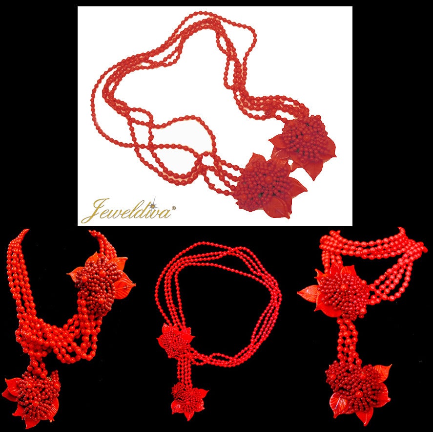 I once saw this necklace is a great collection about 25 years ago.  I have not seen one until I spotted this beauty.  This early vintage Miriam Haskell lariat  necklace features a rich red floral design on twin-fur-clips on a multi-4-strand