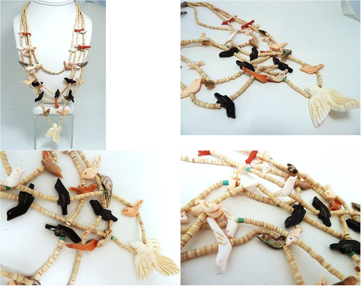 This Native American Zuni necklace features animal beads that are carved from shell and coral. This piece measures 19” long on the inside strand; the largest piece measures 1.75 inches and is the centerpiece of the necklace. The smallest animal