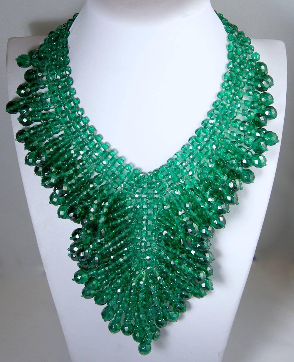 I love Coppola e Toppo and this design is unique and rare to find  This necklace has sparkling, bezel cut green glass beads in a gold-tone setting.  This necklace measures 17 1/2” with a hook closure; the front drop is 5 1/2” x 4” wide.    It is