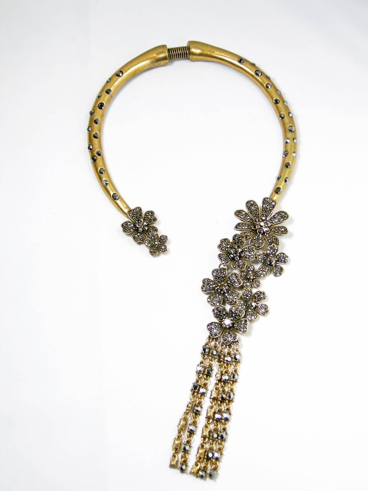 This is over the top Gorgeous! This Oscar De La Renta attributed to be his  clear Crystal Statement Necklace with Fringe. It has a spring mechanism so one size fits all fit. It has an antique gold tone metal with brilliant white sparkling crystal
