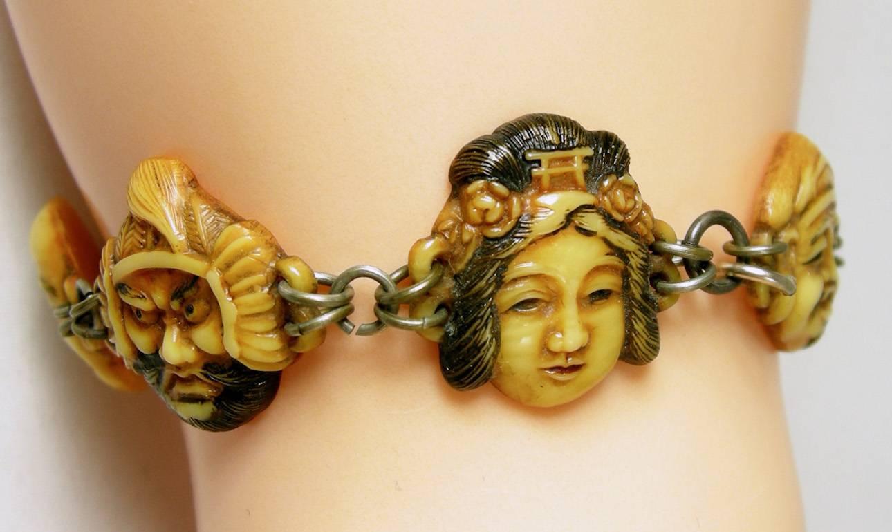 This vintage Toshikane celluloid bracelet is rare and extremely collectible. It features 7 lucky Gods of fortune to bring you prosperity. The faces have raised detailing. The bracelet measures 8” x 1/2”. It is in excellent condition.
