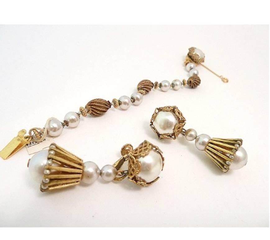 As you know, it’s so very hard to find a bracelet and earrings set by Miriam Haskell that has been kept together, so I was delighted to find these lovelies with faux pearls and etched spacer beads in a gold-tone setting. The bracelet measures 7 ¼” x