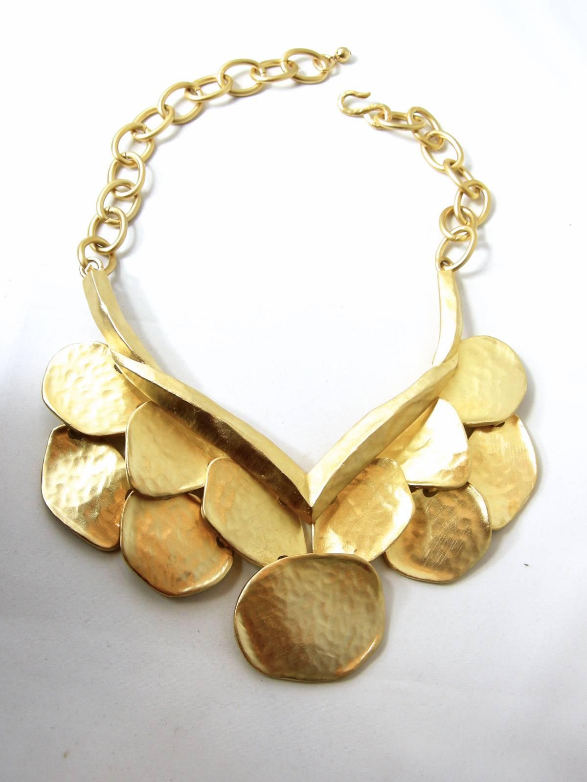Kenneth created this golden wing bib necklace.  During the elimination trials of what he would select for his jewelry line, he eliminated this prototype, which I bought with great joy.  This superb necklace is quite rare. The golden wing is 8” long