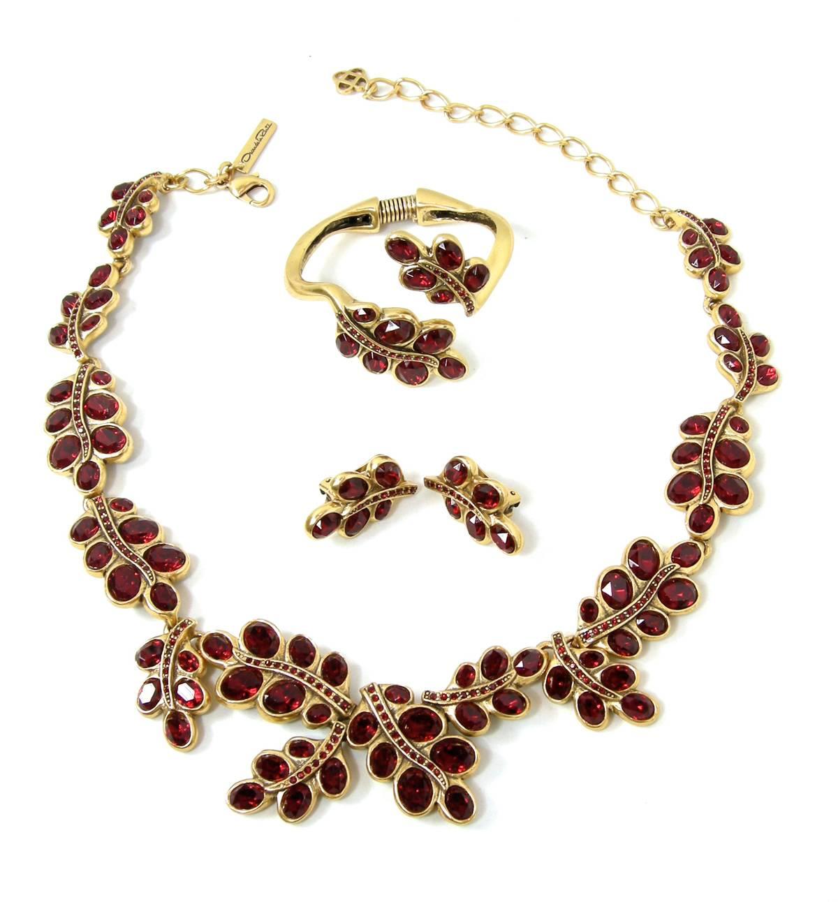 I have seldom come across a couture vintage Oscar de la Renta Parure.   The set is beautifully made and probably from the late 70s. The necklace has ruby red garnet color crystals and is 22-1/2” long. The center panel is almost 3’ wide and 1-1/2”