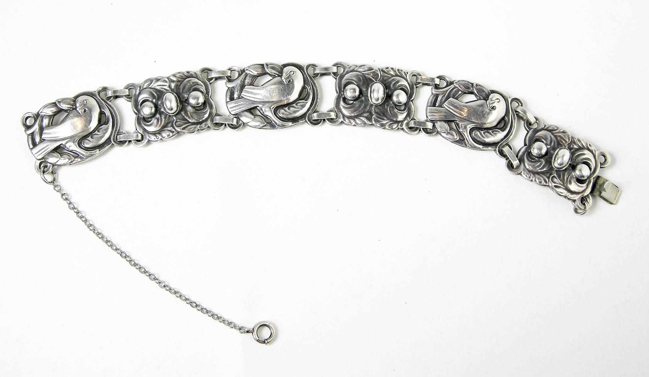 This Norseland bird bracelet in sterling silver looks as if it was Jensen Danish inspired.  It is signed with the Norseland /sterling and Reg US Pat Off.  It also must have been given to “Jimmy” with the date “1941”.  It has a fold over clasp and a