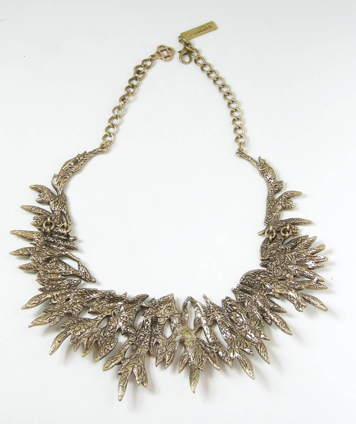 Ethereal and elegant this statement necklace features an intricate motif of cascading Austrian crystals leaves in a mixed silver/gold-tone setting. It is simply dazzling with its fabulous pave crystal leaves. The necklace is very flexible and is