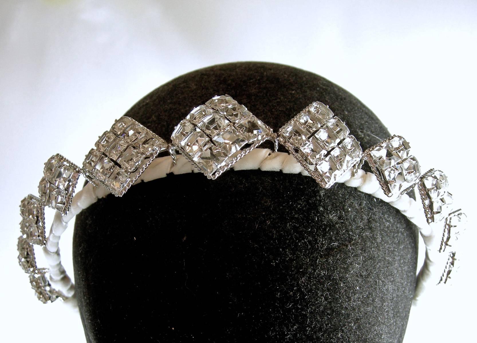 You can wear this magnificent creation by Robert Sorrell as a tiara for your wedding … or as a headband for a fancy dinner… the choice is yours.  It is composed entirely of square cut vintage Austrian and Czech crystals.  Each crystal is hand