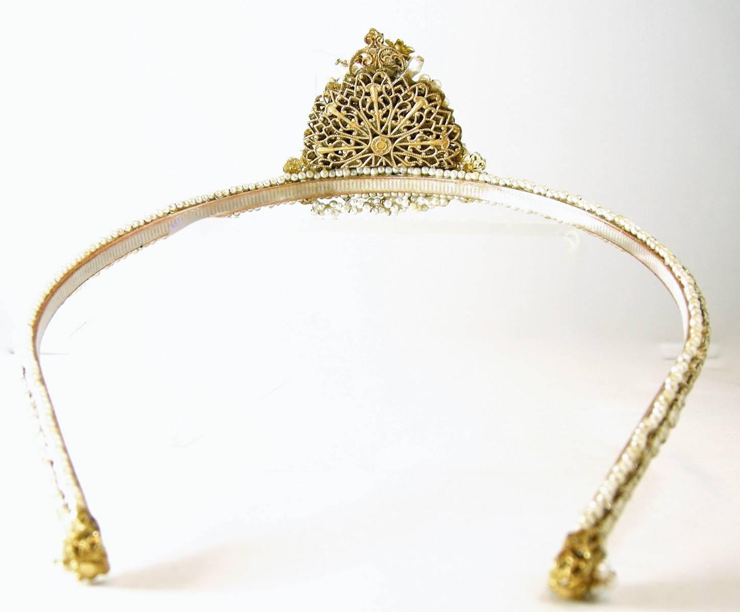 I have been very lucky to be able to get these vintage Haskell tiaras from a top collector.  Of course, I have to beg her for each one she sells me … but it’s worth it.  This one is 15” from one end to the other and sits comfortably on the head. 