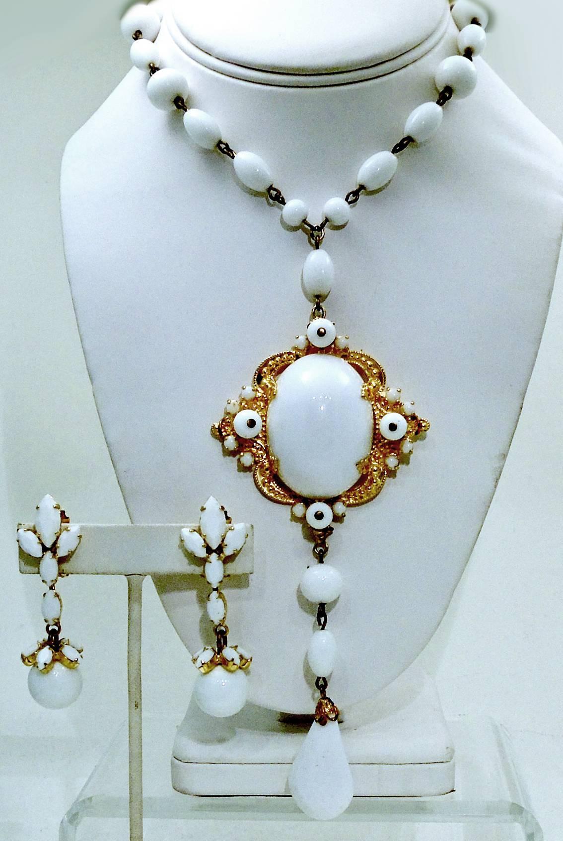 This vintage signed Schreiner NY runway necklace & earring set features white milk glass cabochons. The necklace has a huge 5-1/2” drop. Everything is original. The necklace measures 18