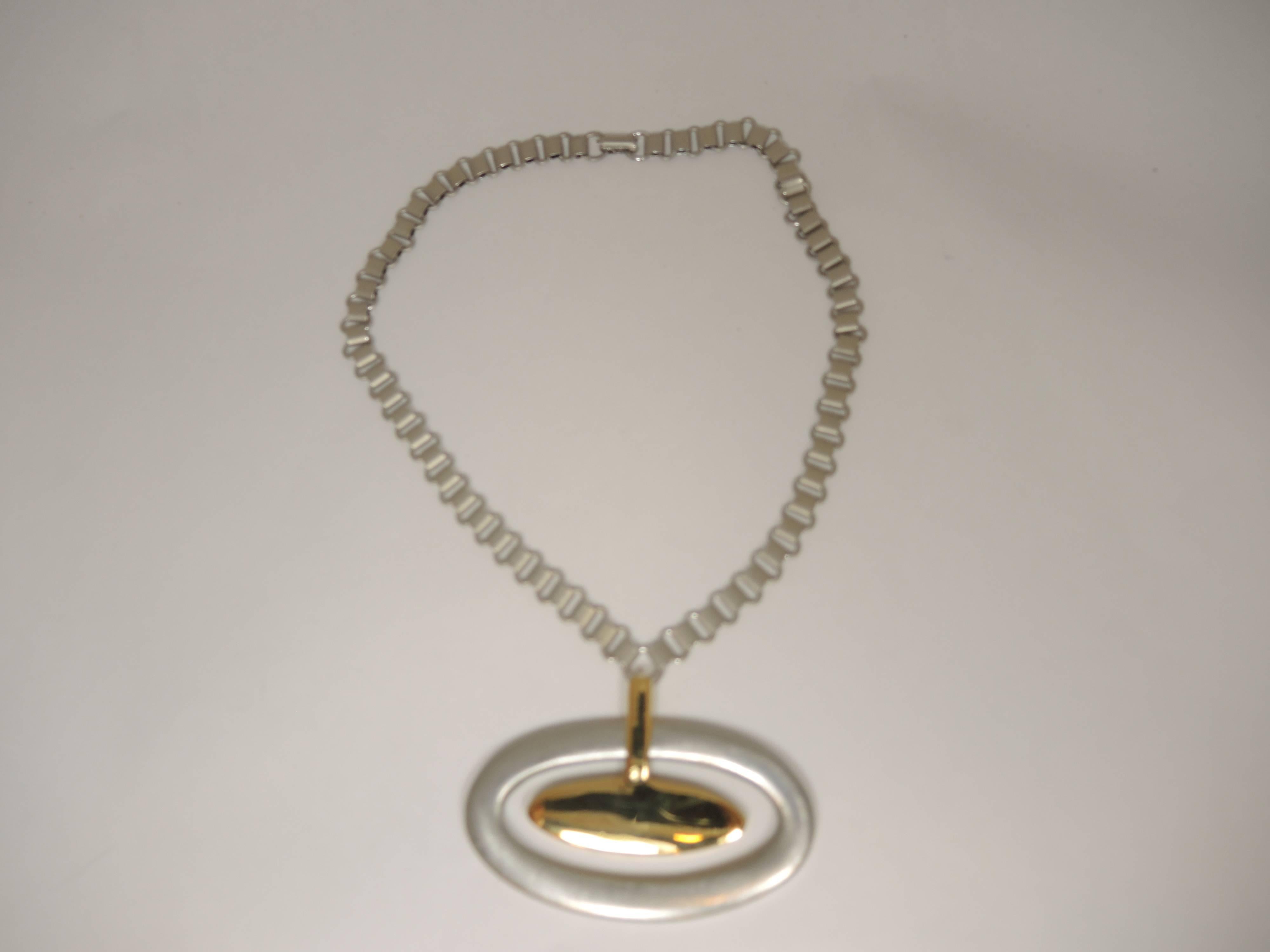 Vintage Faux Silver & Gold Oval Pendant Necklace In Excellent Condition In New York, NY