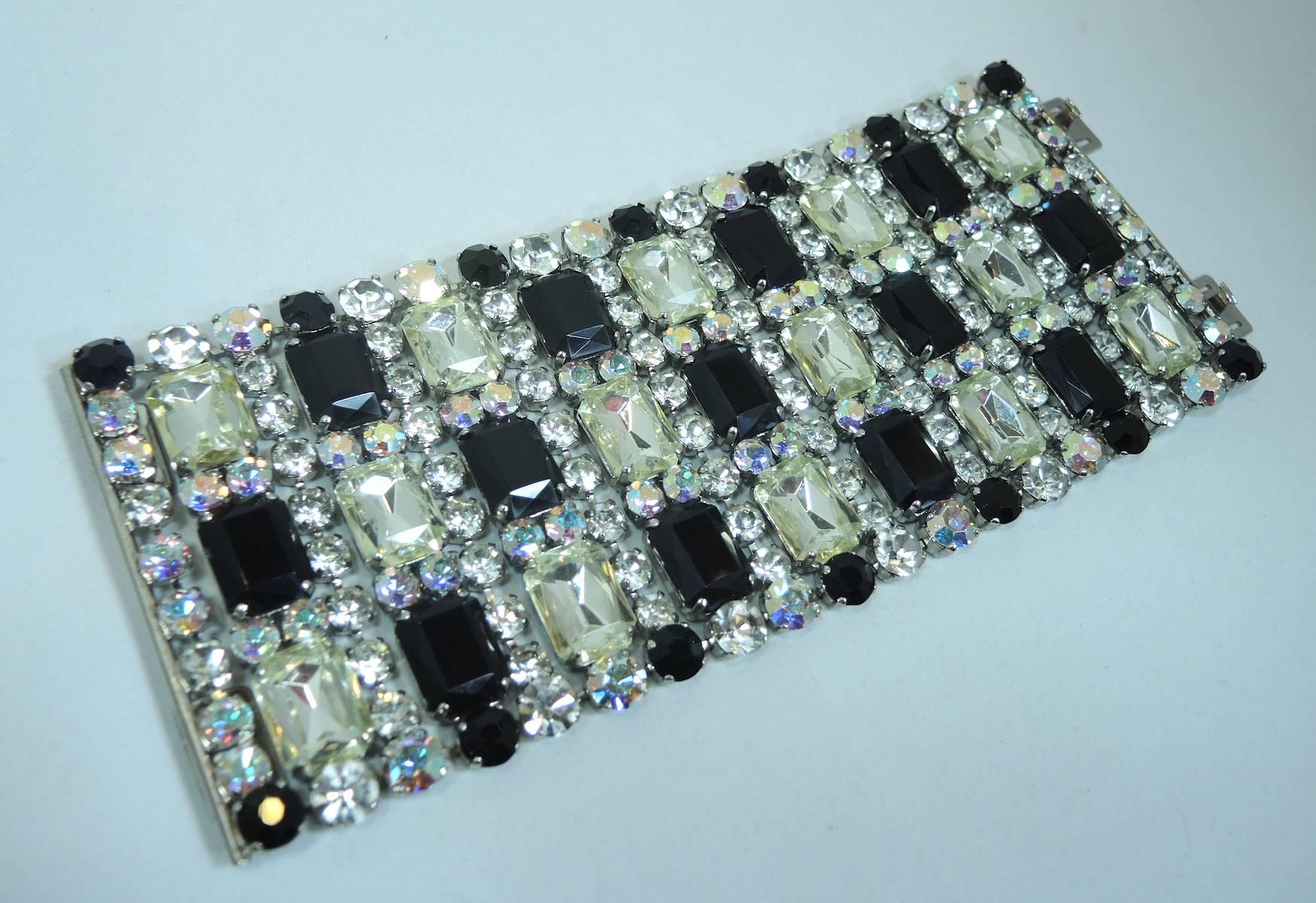 I was very fortunate to come across two of these bracelets and had to have them! They are fabulous and were designed by the famous Gianni De Liguoro of the Italian Bijoux Company. This bracelet has vibrant clear and black rhinestones throughout this