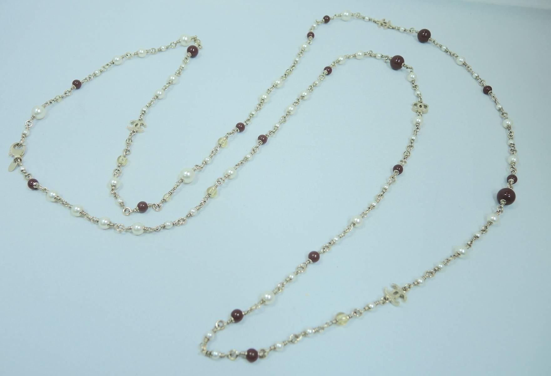 Authentic Chanel Pearl With Ruby Glass Bead Necklace In Excellent Condition In New York, NY