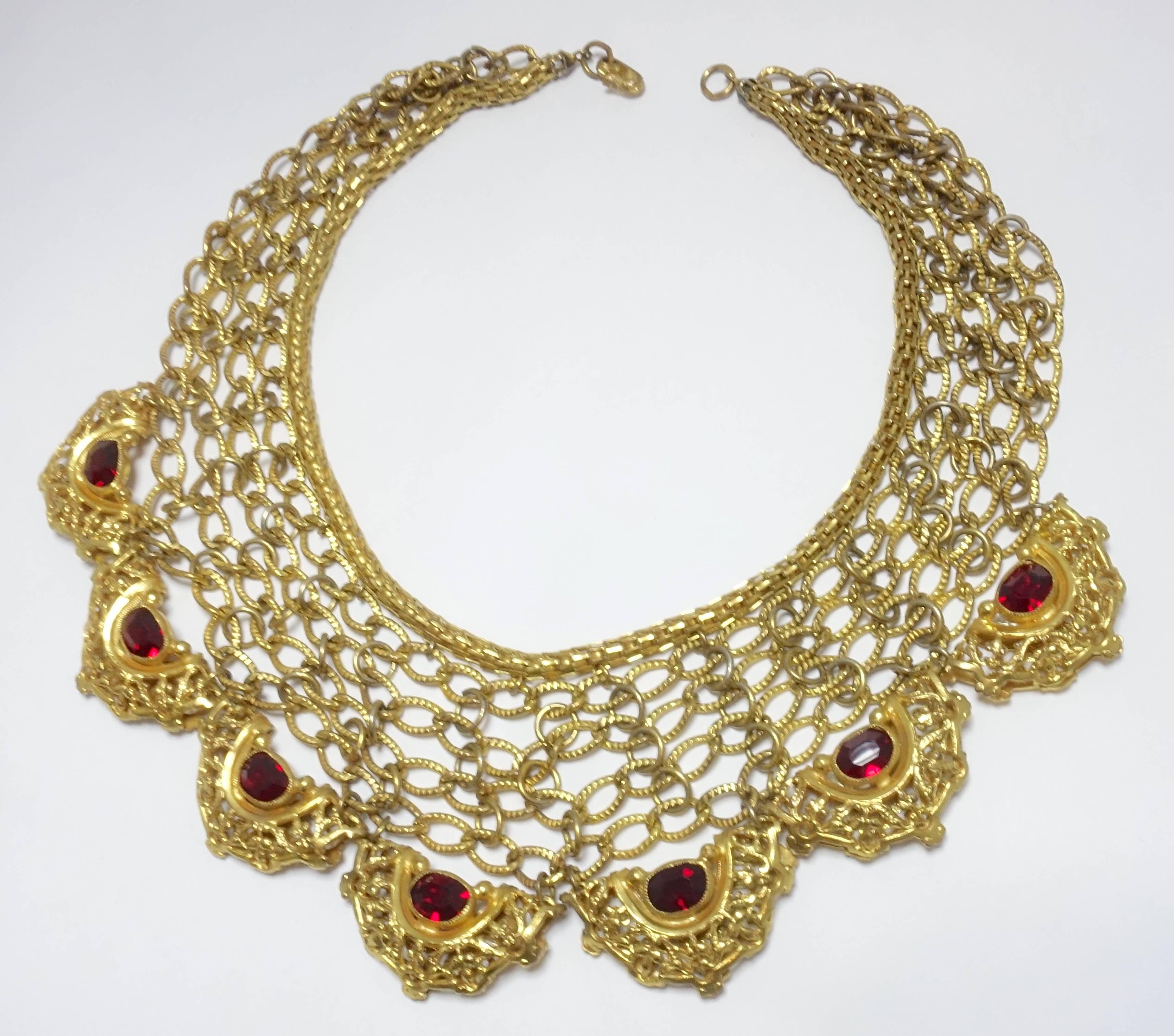 When I saw this necklace, it was love at first sight.  The intricate work on this necklace is outstanding.  It has interlocking open link chains connecting throughout the necklace making a lace look.  The bottom has 7 intricately designed