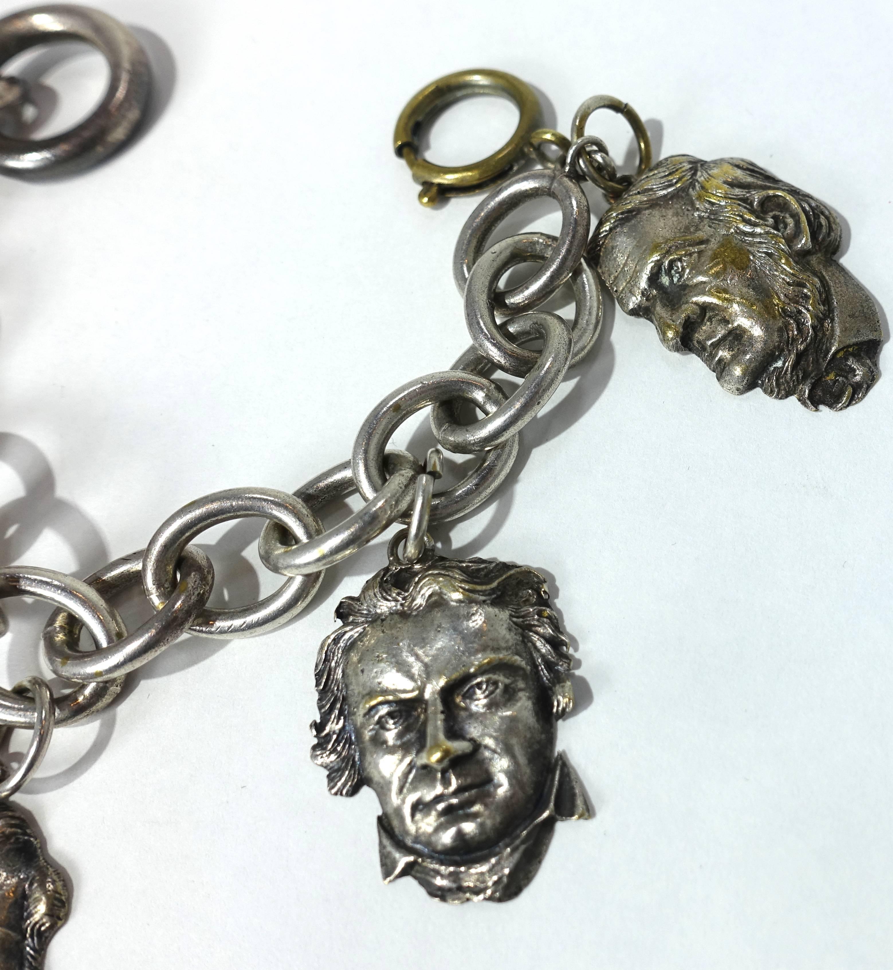 Classical music lovers must see this. This vintage bracelet features 5 charms each with an image of the classical composers on one side and his name and birth/death dates on the other.  Composers are Mozart, Bellini, Beethoven, Gounod and Wagner. 