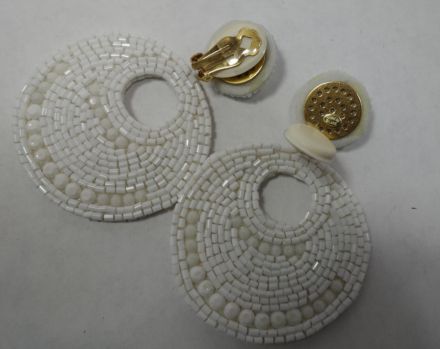 Signed Kenneth Jay Lane White Bead Hoop Drop Earrings In Excellent Condition In New York, NY