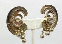 Vintage Gold Tone Swirl Clip Earrings