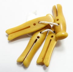 Four (4) Vintage Art Deco Butterscotch Bakelite Clothespins
