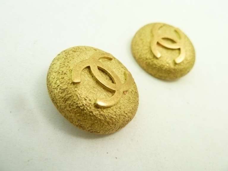 I found more of the double cc Chanel earrings.  These vintage signed earrings feature the famous CC logo in a gold-tone setting.  In excellent condition, these clip earrings measure 1” in diameter and are signed Chanel 94A Made in France.