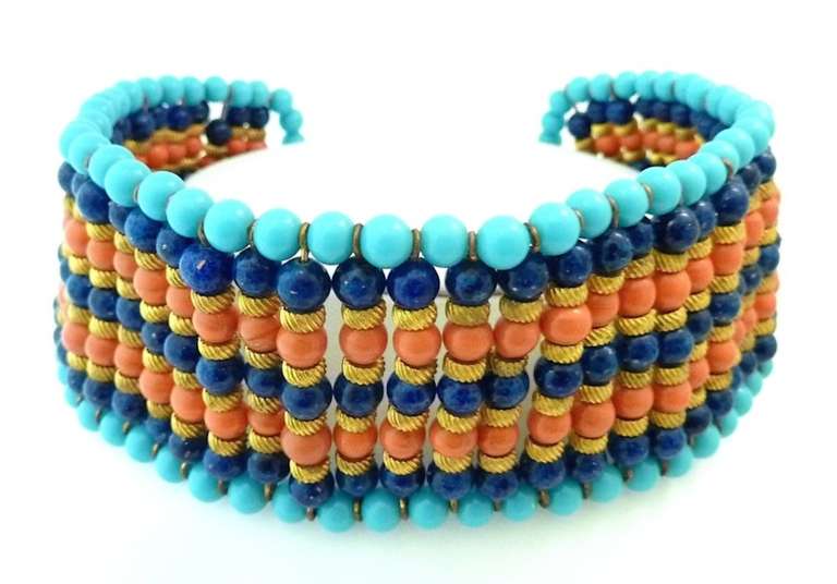 I have not been able to find or afford to buy a DeLillo necklace for some time. A friend found it for me and it is a neck collar made superbly. This vintage signed DeLillo necklace features genuine coral, turquoise and lapis beads in a gold-tone