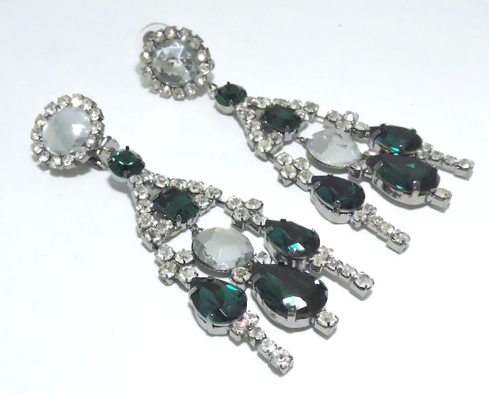 You will be noticed if you wear these earrings.  They are beautiful!  These Kenneth J. Lane earrings feature green and clear crystals in a silver-tone setting.  These clip earrings measure 3 5/8” x 1 ¼”, are signed “Kenneth Lane” and are in