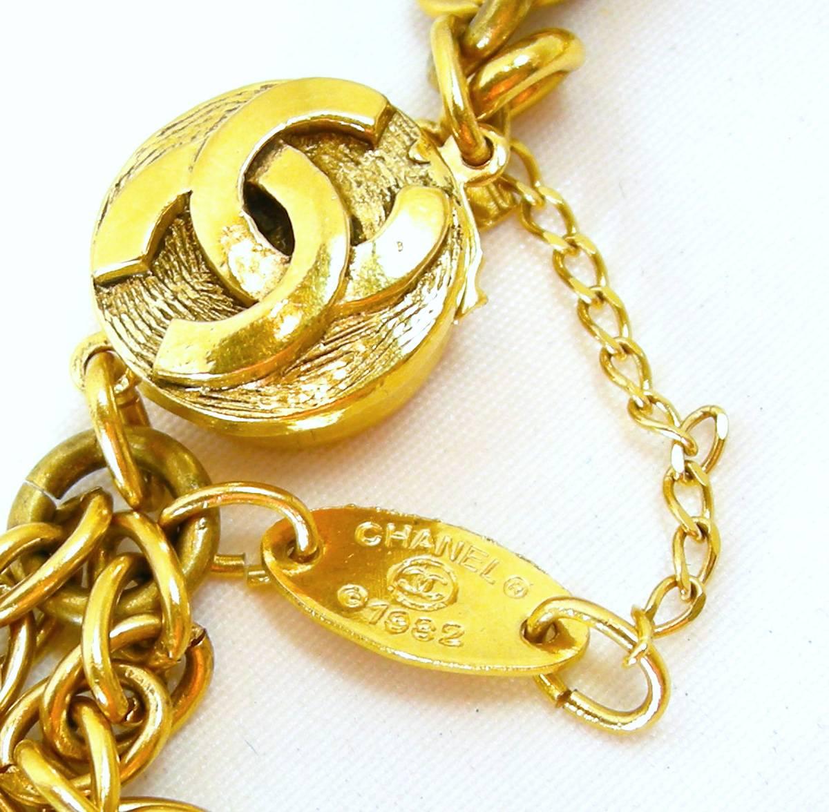 This vintage Chanel sautoir necklace is one of the most sought after sautoirs because it can be doubled … it’s 34”.  It can be worn doubled.  It has green Gripoix glass on each side of an oval medallion with a green Gripoix center … all on a rope
