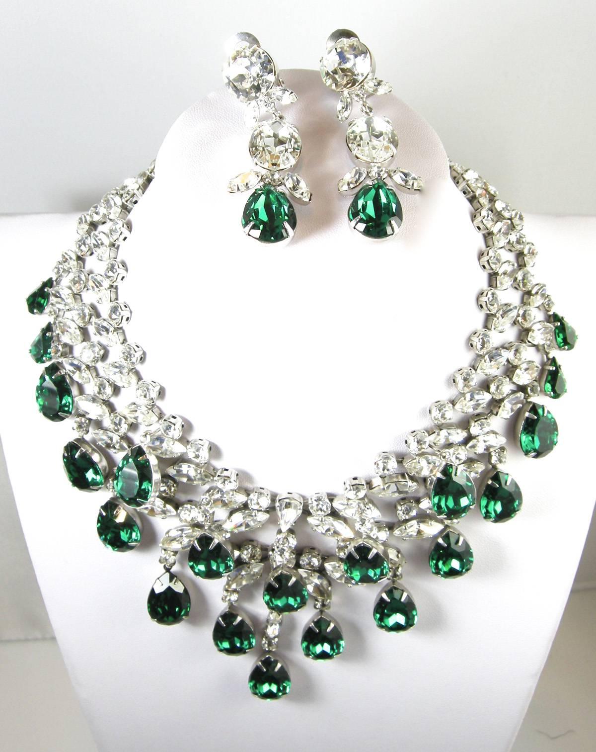 The collector who sold me her collection has superb taste and when I found this vintage Schreiner I almost fainted.  It is that gorgeous.  It has a 3-dimensional design with brilliant crystals and pear-shaped green crystals drops.  It is 17” long