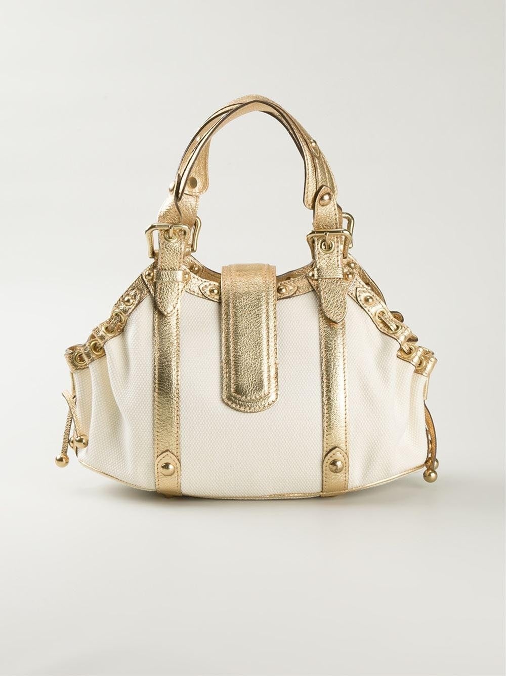 This white and gold-tone cotton and leather 'Antigua Theda GM' tote from Louis Vuitton features a gold-tone buckle fastening, a drawstring fastening, a leather trim, a gold-tone stud detailing, buckled handles, a cotton lining, an internal patch