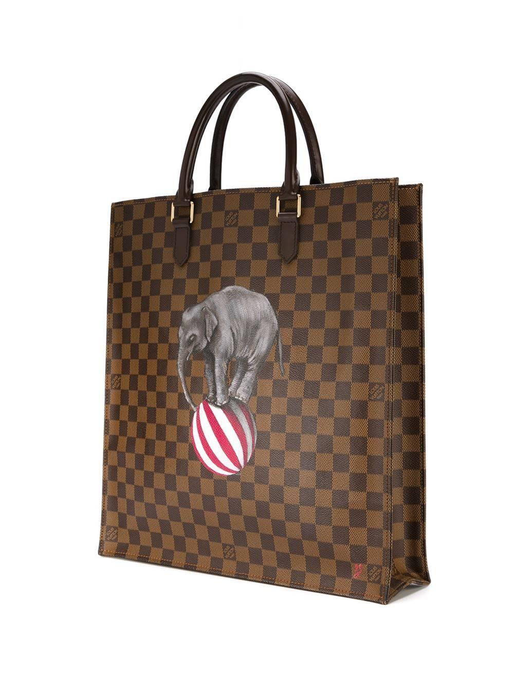 Hand painted vintage Louis Vuitton Damien leather Sac Plat bag featuring a customised hand painted design. 

Material: Damien Leather 

Colour: Brown, Hand-painted design 

Rewind Vintage Emotional Baggage

The brainchild of Rewind, these