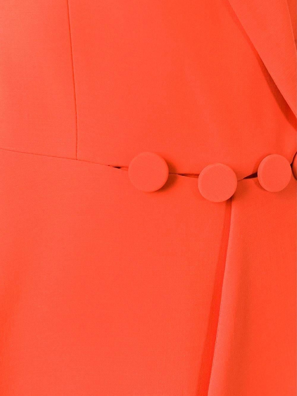 Orange wool-silk blend double breasted flared dress from Christian Dior featuring notched lapels, a sleeveless design, a double breasted front fastening, a fitted waist, a flared style, an asymmetric hem and a mid-length. 

Colour: