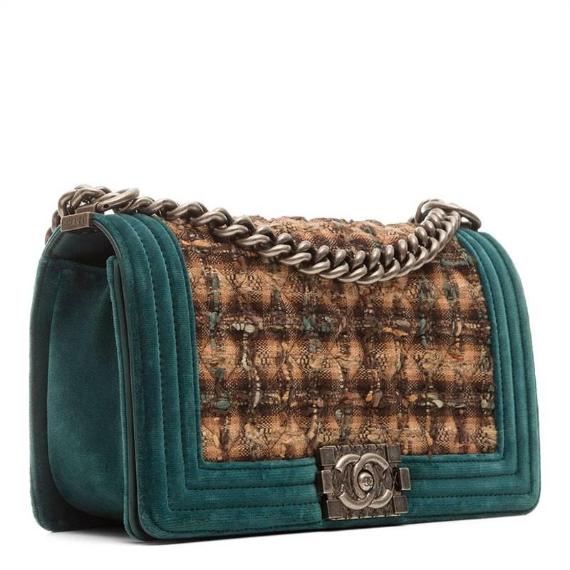 Classic design gets a textured update in this teal and tweed Boy bag. In good condition, this bag has a quilted flap complemented by a classic Chanel press lock. The gunmetal grey chain is softened by a teal leather strap and the interior is dark