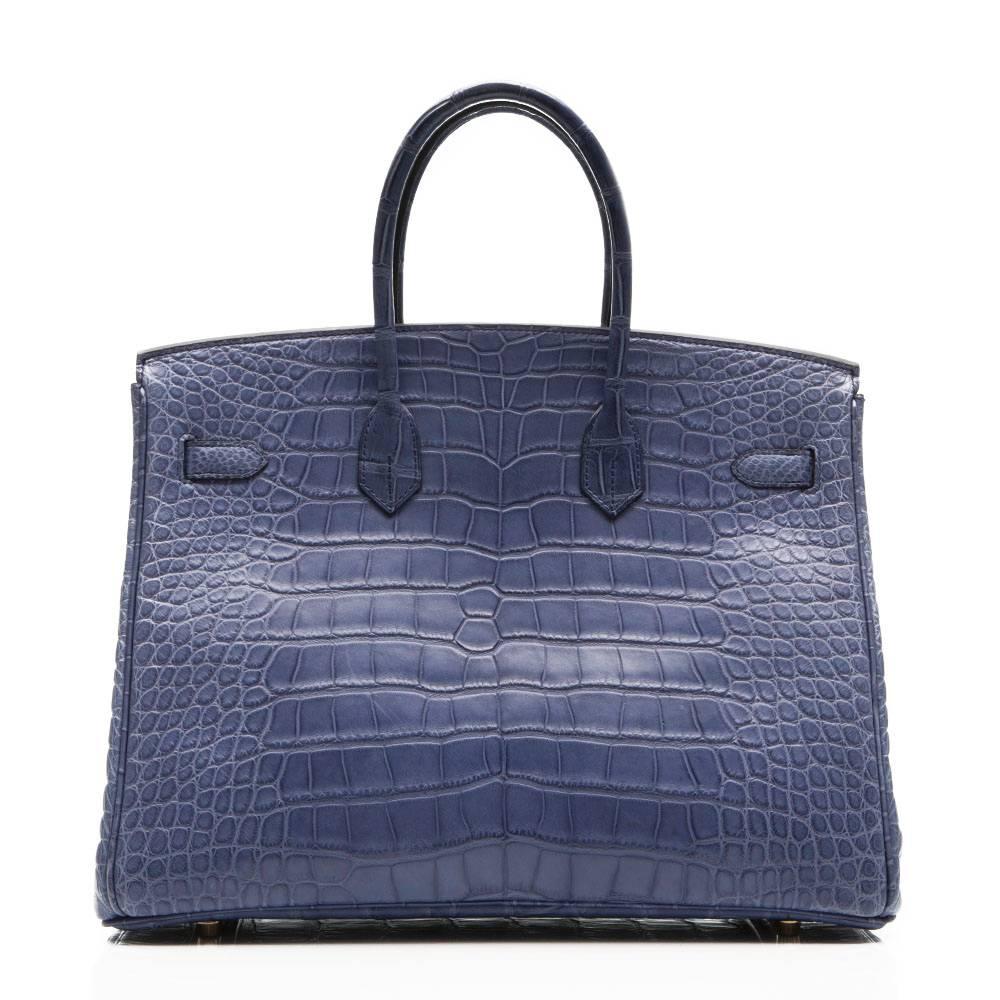Hermes alligator leather Birkin bag in matte Brighton Blue featuring gold-plated hardware. The interior of the bag is lined in goats leather and has one open and one zipped pocket.
This bag comes with its original dust bag and lock an key.
