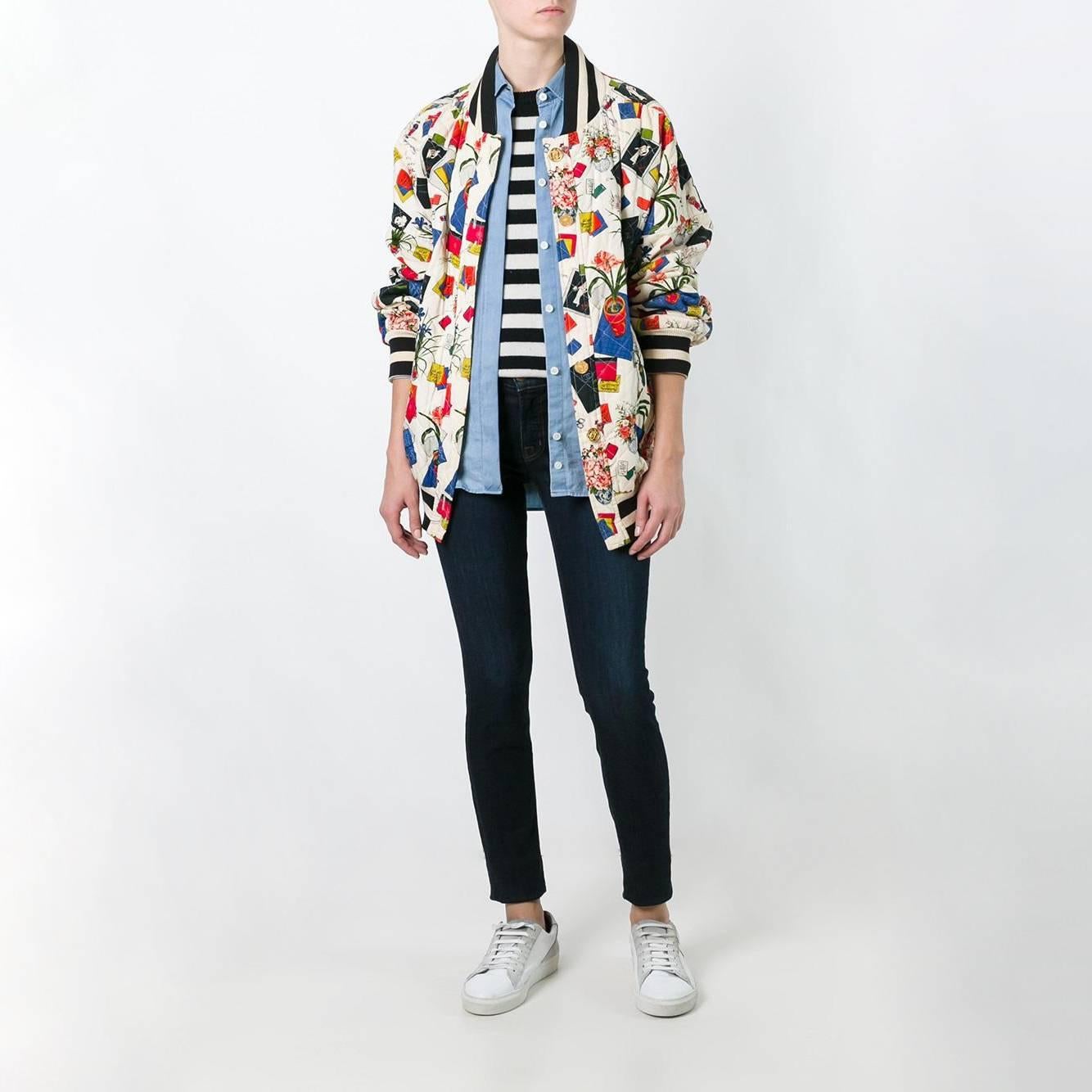 This vintage Chanel bomber jacket feels highly relevant to the 80s revival and sportswear trends happening today. Its athletic design includes varsity banding details across the collar, cuffs and waist, and a quilted cream cotton. It is patterned