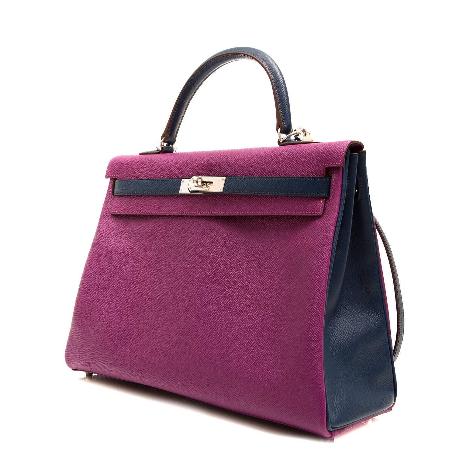 inject a pop of colour to your wardrobe with this intensely vivid Hermès Kelly handbag. In this edition, in a two tone anemone and blue de Malte are offset beautifully with silver-plated hardware. It is exquisitely crafted from Epsom leather, a