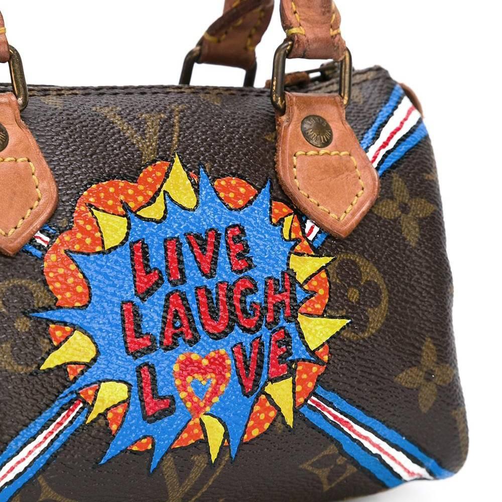 Adorable in its miniature size, this vintage Louis Vuitton micro Speedy handbag features a classic Monogram Canvas leather that has been hand-painted with Pop Art-inspired illustrations as part of our Emotional Baggage series.

The brainchild of