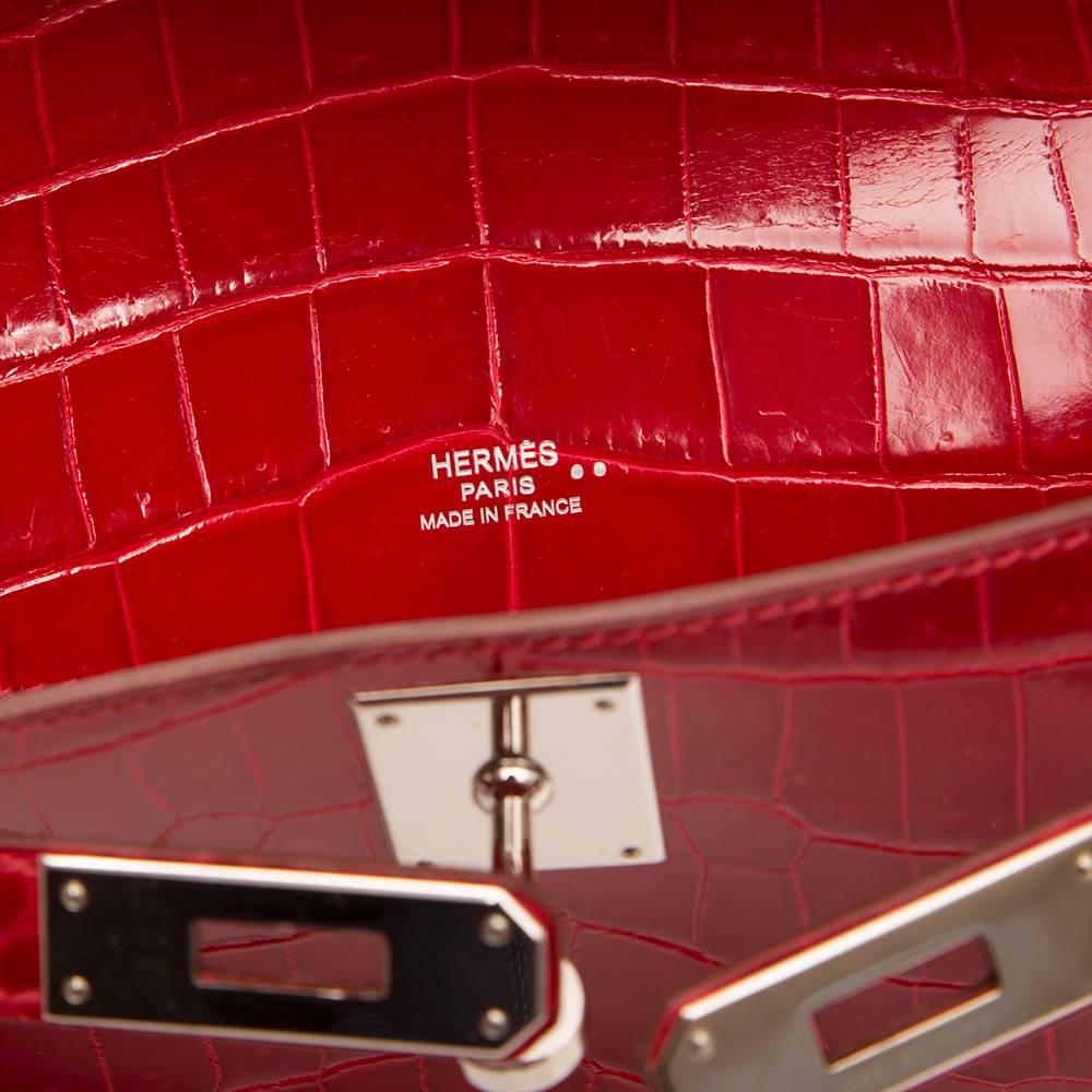 Hermes Braise Red Kelly Cut in shiny Porosus Crocodile withsilver​ hardware. 2