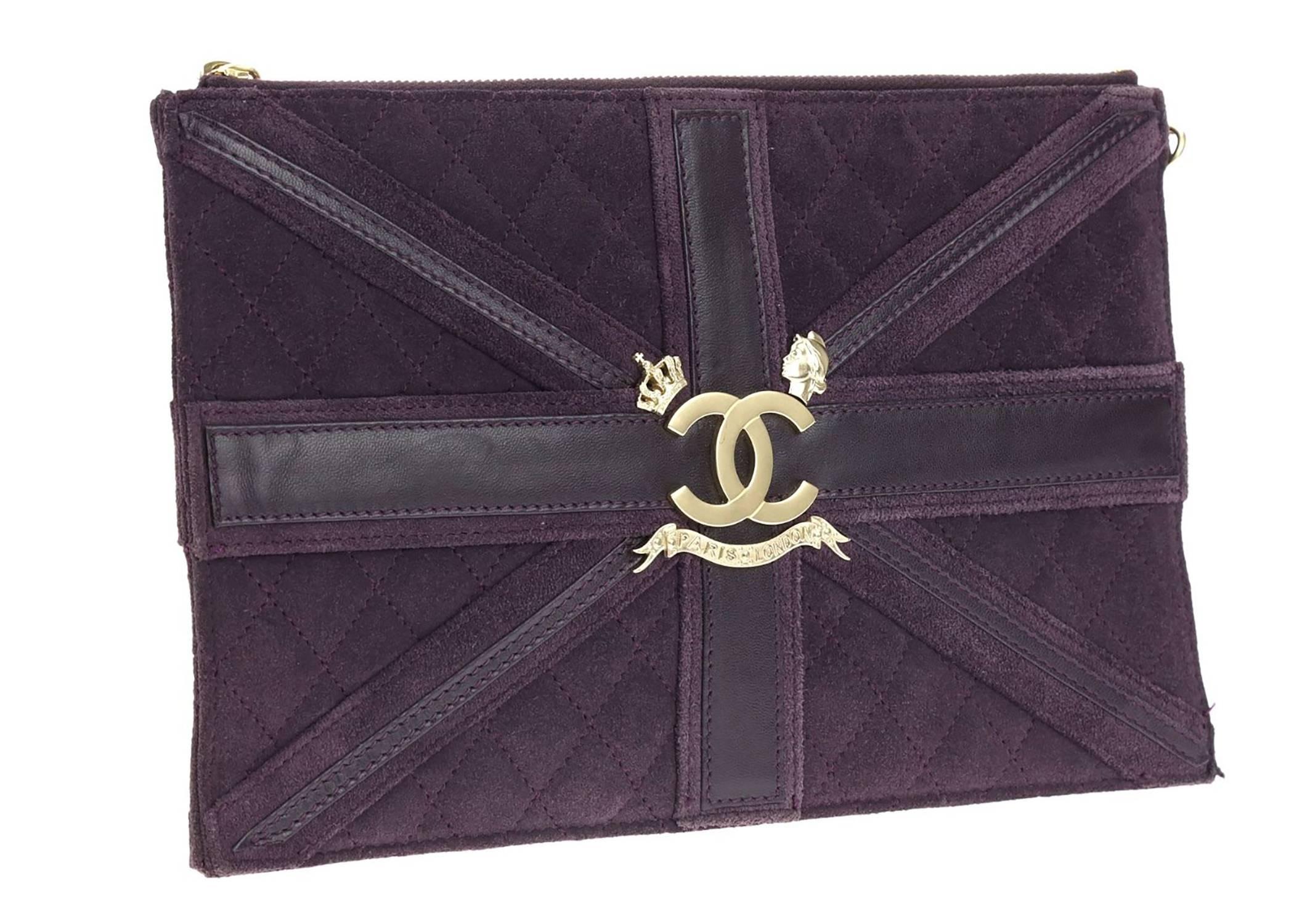 The Chanel Purple Suede Union Jack Zippered Wristlet is the perfect collectable bag to wear over your shoulder or as a wristlet to carry your daily essentials. This bag is featured in purple suede with purple leather piping details. The iconic CC